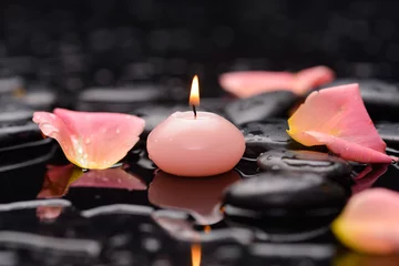 Rolgordijnen pink rose petals with pink candle and therapy stones © Mee Ting