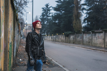 Punk guy posing in the city streets
