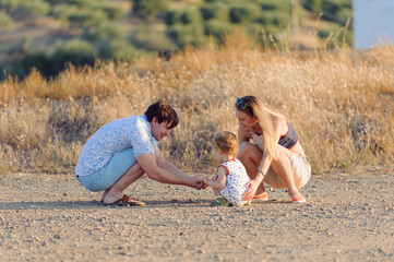 Family Playing with Child