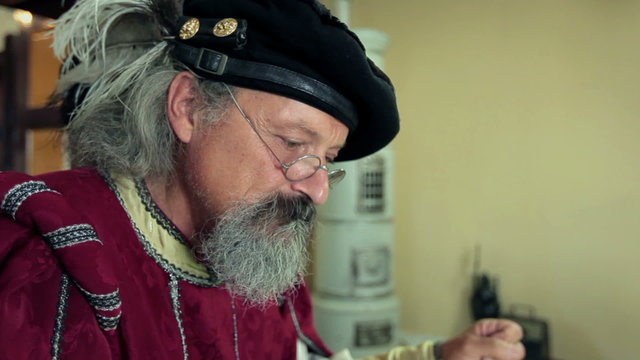 Detail of medieval scholar at work