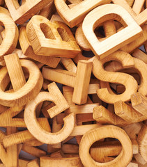 Surface covered with multiple wooden letters