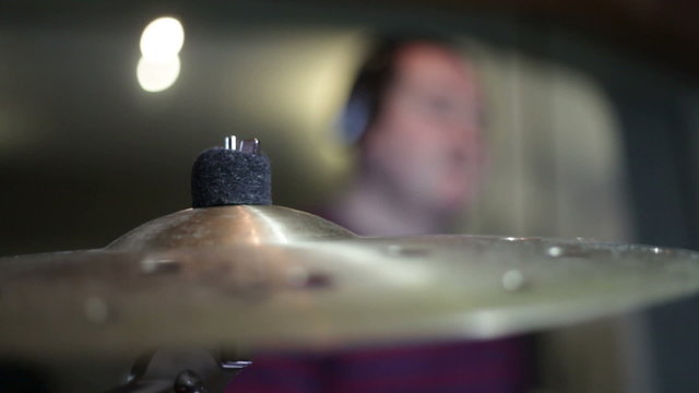 close up shot of musican playing drums