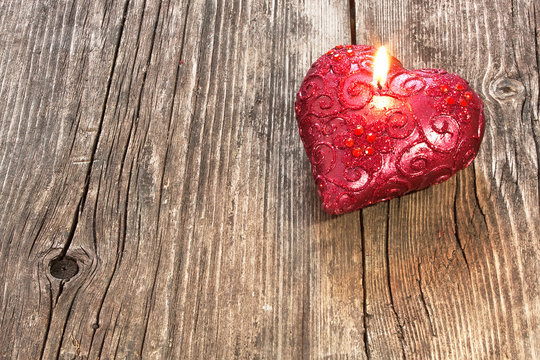 Red heart shaped candle