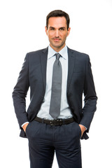 businessman with hands in his pockets