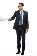 businessman smiling and shaking hand