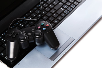 Gamepad is lying on a keyboard © blackday