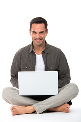 Man sitted on the floor with laptop