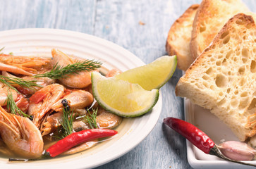 Boiled shrimps and lime