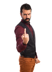 Fototapeta premium Man wearing waistcoat making horn gesture