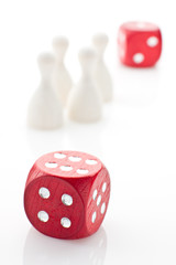 Two dice and gaming pieces