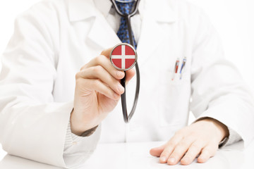 Doctor holding stethoscope with flag series - Denmark