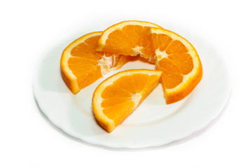 Fototapeta na wymiar orange on a white plate