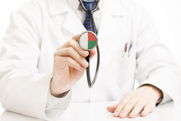Doctor holding stethoscope with flag series - Madagascar