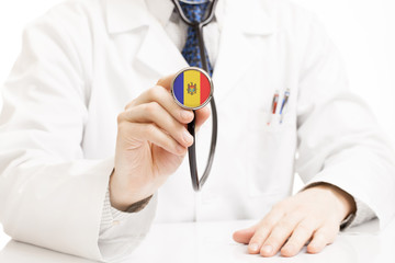 Doctor holding stethoscope with flag series - Moldova