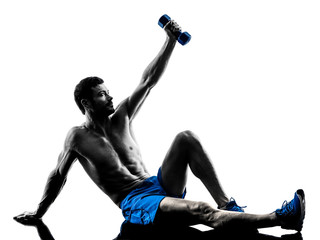 Fototapeta premium man exercising fitness plank position exercises silhouette