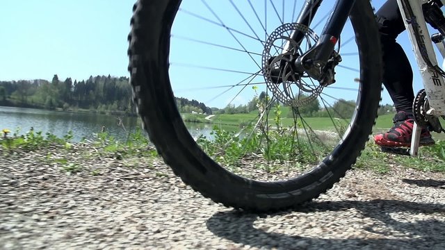 Bikes wheel on a gravel road