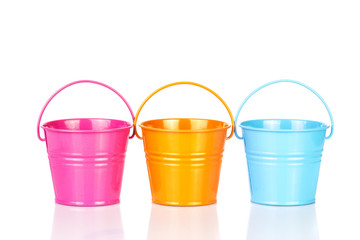 Colorful buckets isolated on white