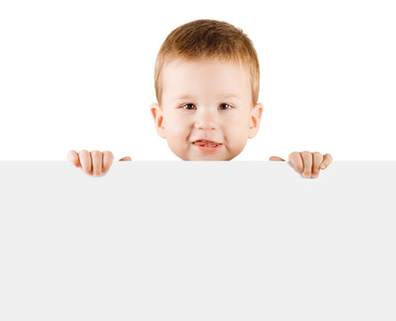 Baby boy holding white blank board