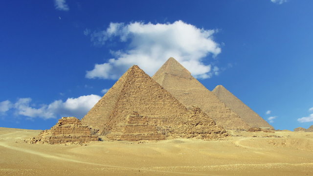 Timelapse with clouds over great pyramids at Giza Cairo in Egypt