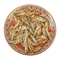 Fried sprats fish on a plate