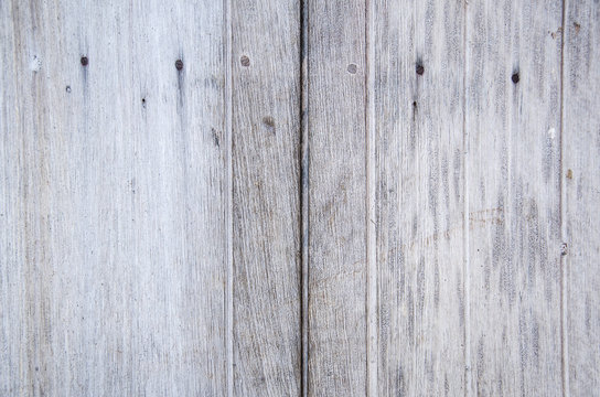 Old grungy wooden planks texture with grey
