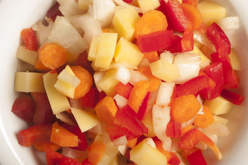 Colorful pepper and onion cut in cubes