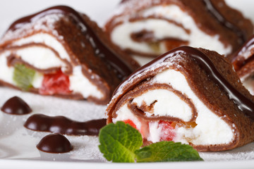 Asian dessert: chocolate rolls with cheese macro. Horizontal