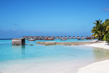 Fototapeta na wymiar Beach bungalows, Maldives
