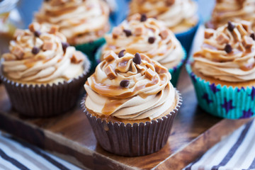 Cupcakes with cream cheese, caramel and chocolate