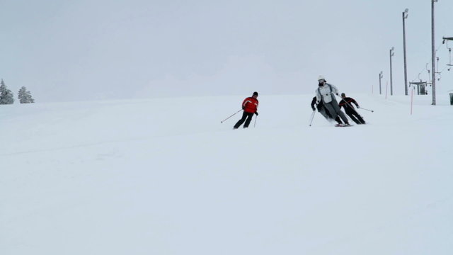 a group of people while skiing on the ski slope