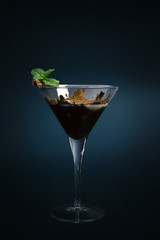 Chocolate based Cocktail isolated on dark background