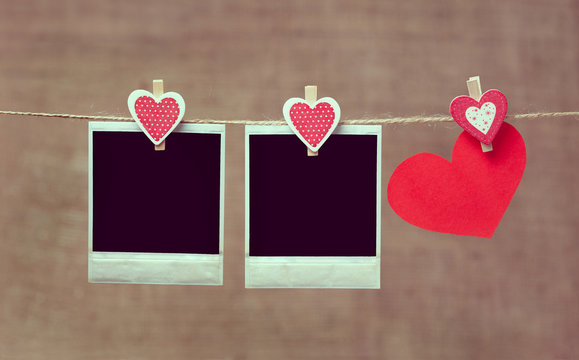Two polaroid photo frames and heart for valentines day with vint