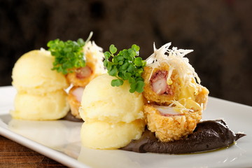 Fried octopus with potato and sauce