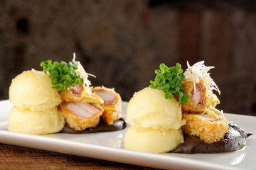 Fried octopus with potato and sauce