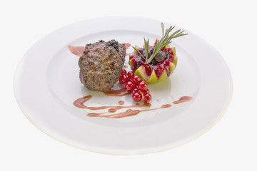Cutlets bear with baked apple and cranberry sauce