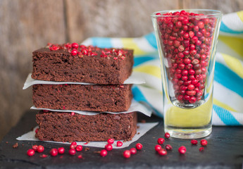 chocolate and pink pepper brownie cakes.  shallow depth of field