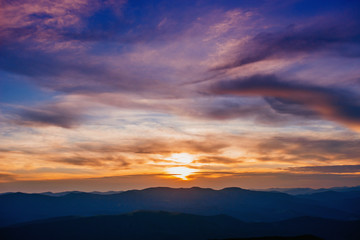 Fototapeta na wymiar colorful sky with sun background in mountains. sunset, sunrise.