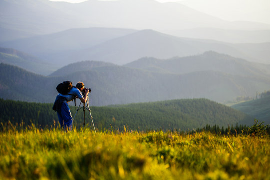 Professional photographer journey through the mountains.