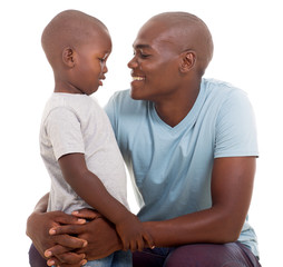 african man talking to his son