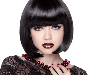 Fashion Brunette Girl model with Black bob hairstyle. Lady vamp.
