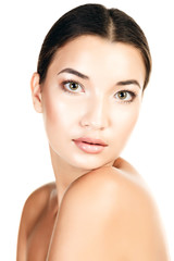 Fototapeta premium Beautiful girl with clean fresh skin, white background, copyspac