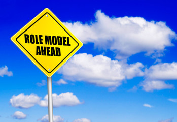 Role model ahead message on road sign