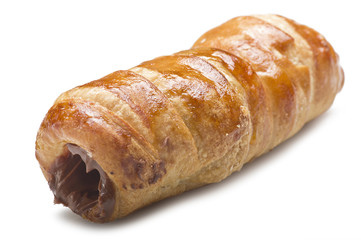 Italian cannoli filled with egg custard on white background