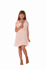 cute little girl singing into a microphone