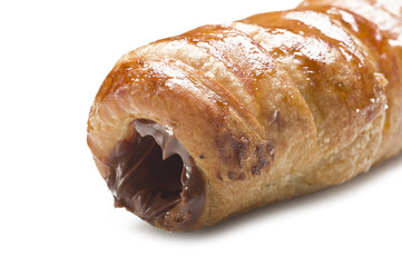 Italian cannoli filled with egg custard on white background