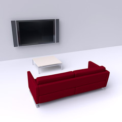 Red sofa with a flat screen TV on the wall