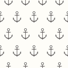 Nautical theme. Seamless pattern with silhouette of anchors