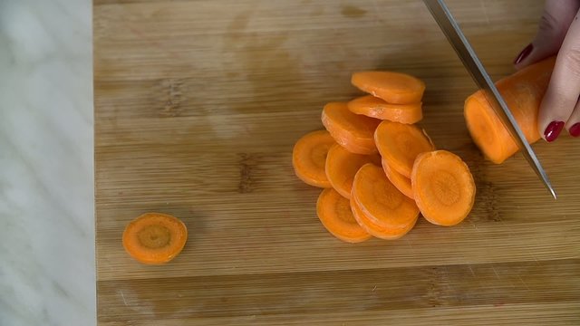 Detail of slicing a carrot