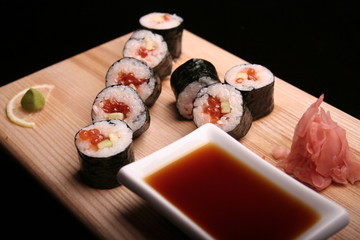 traditional sushi on black background