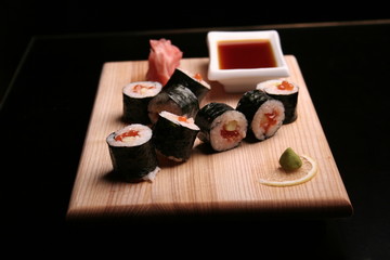 traditional sushi on black background